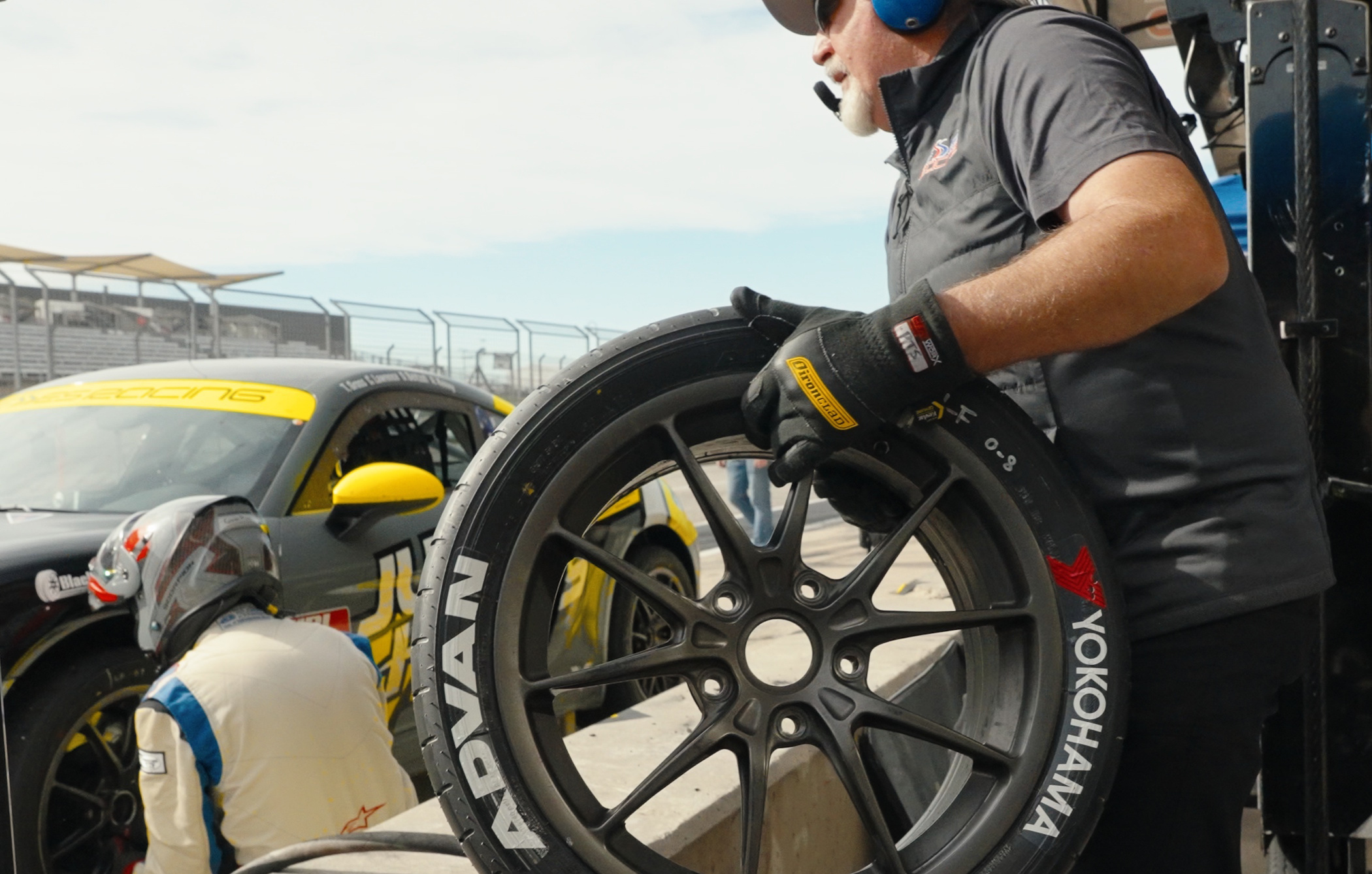 Tech carrying Yokohama Advan tire in Just Hands