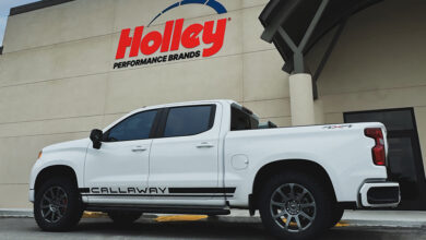 White truck with Callaway logo parked in front of Holley Performance building