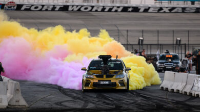 Car with colored smoke during burnout