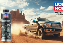 Can of LIQUI MOLY Oil treatment with pickup truck in background