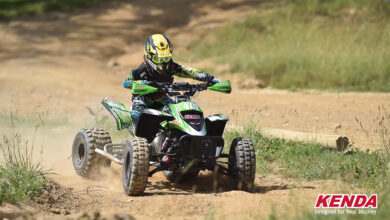 ATV on dirt track with Kenda logo copy