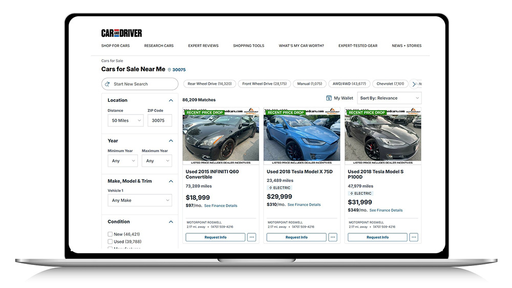 Laptop screen showing Car and Driver Marketplace