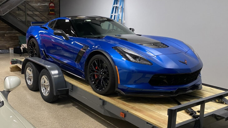 Blue corvette on trailer