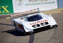 Classic Toyota race car on track at Rolex Monterey Motorsports Reunion