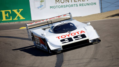 Classic Toyota race car on track at Rolex Monterey Motorsports Reunion