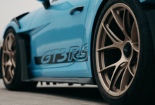Down low close-up of Porsche 911 GT3 RS with blue film by XPEL