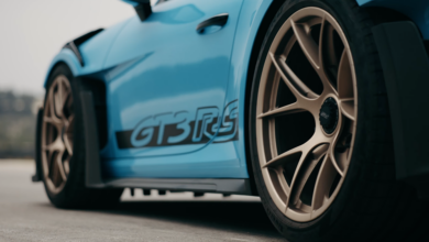 Down low close-up of Porsche 911 GT3 RS with blue film by XPEL