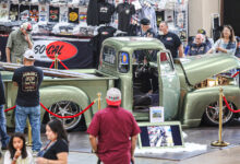 Grand National Truck Show crowd looking at classic truck