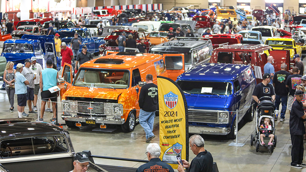 Grand National Truck Show filled with vans trucks and people
