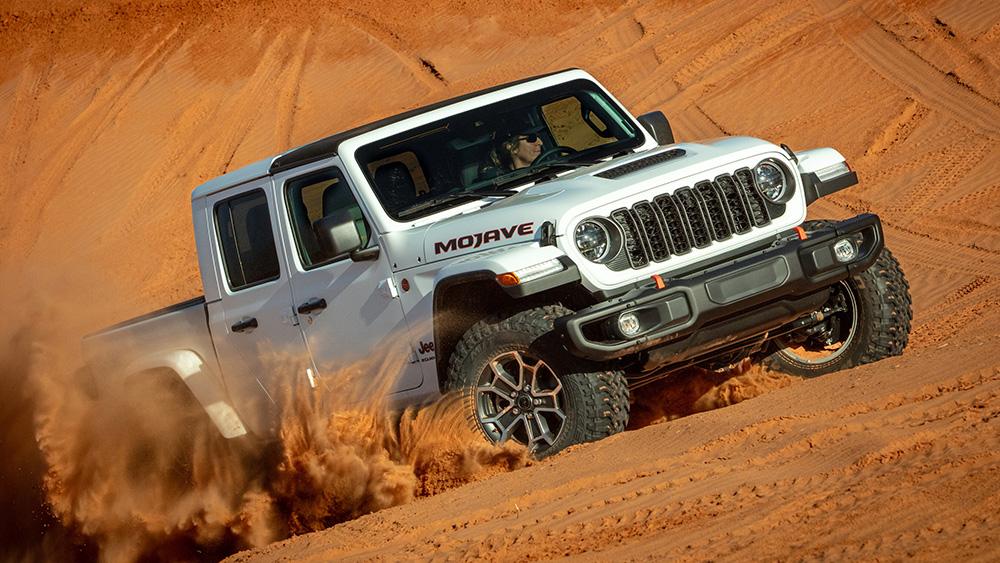 Jeep Mojave kickking up sand in the dunes