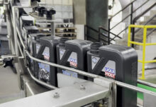 LIQUI MOLY bottles on conveyer belt waiting to be filled