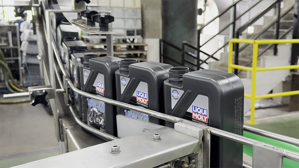 LIQUI MOLY bottles on conveyer belt waiting to be filled