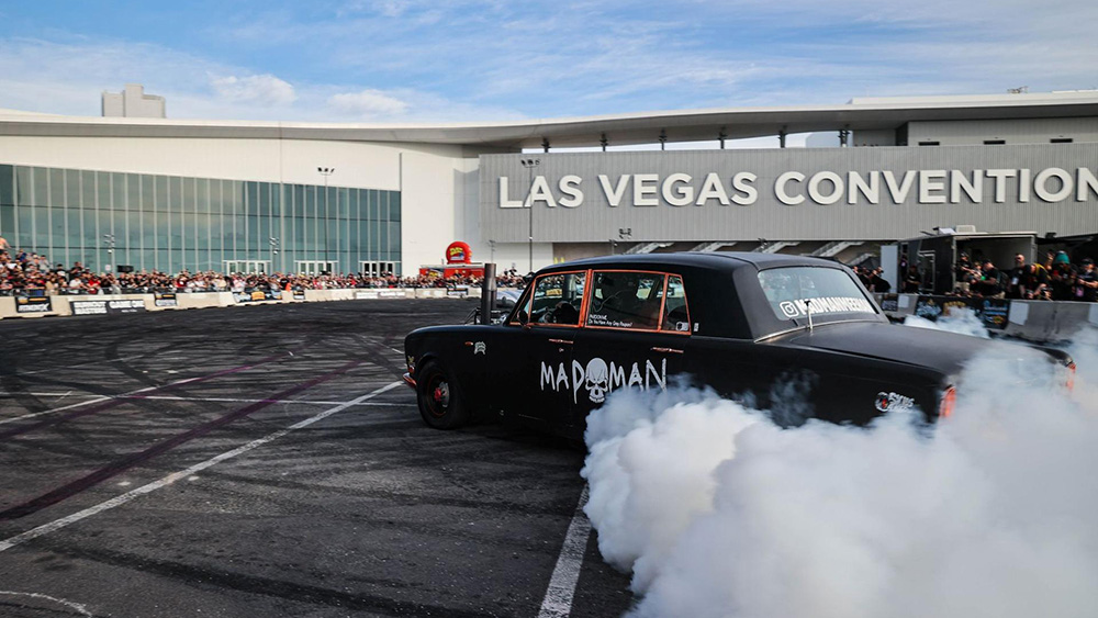 Madman Car doing burnout with white smoke