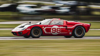 Red 98 race car speeding on track