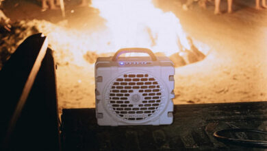 Turtlebox speaker in truck bed with beach campfire