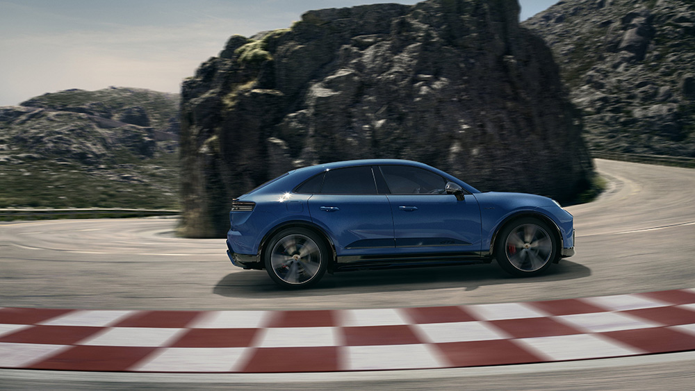 Blue 2026 Macan GTS on racetrack