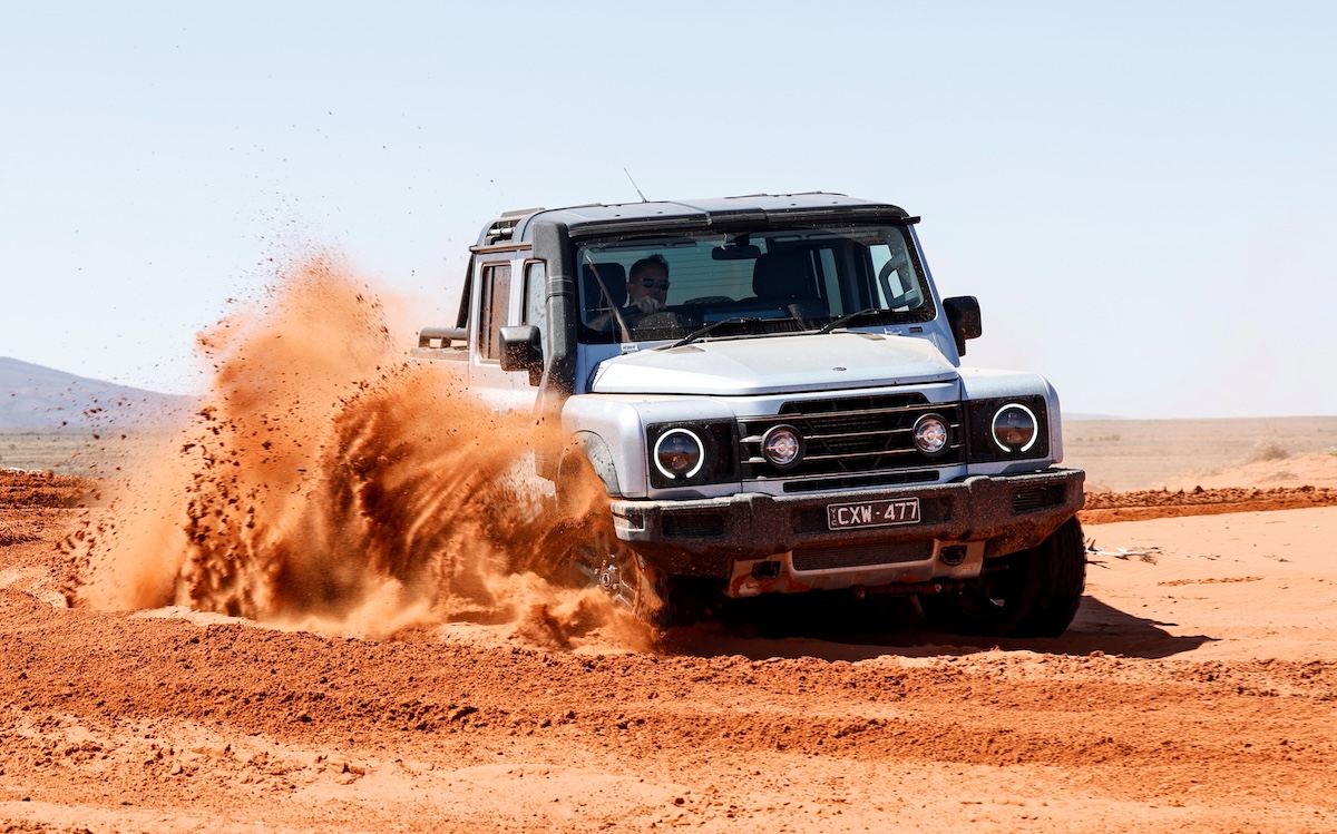 INEOS Grenadier power slide in red dirt