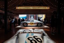 Luftgekühlt 11 stylized porsche display with cars at intersecting angles