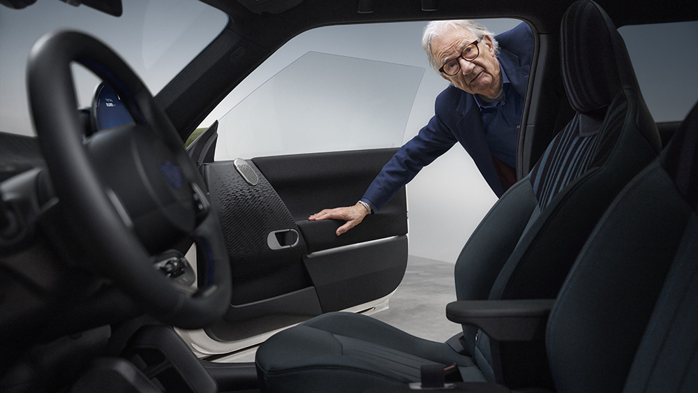 Paul Smith looking through passenger door of MINI Paul Smith Edition