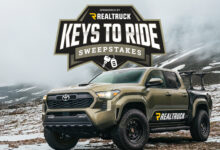 RealTruck Keys to Ride Logo with custom Toyota Truck