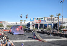Three bikes jumping ramps at Nitro Circus SEMA Show