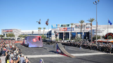 Three bikes jumping ramps at Nitro Circus SEMA Show