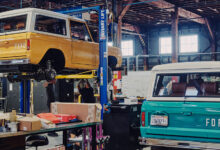 Two Ford Broncos in shop being conerted to EVs