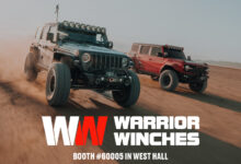 Two Jeeps in dunes with Warrior Winches Logo