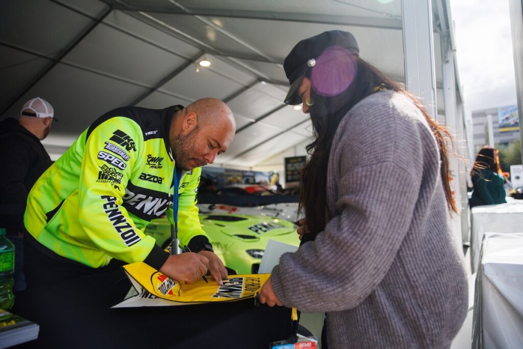 influencer pennzoil jonny grunwald signs autograph