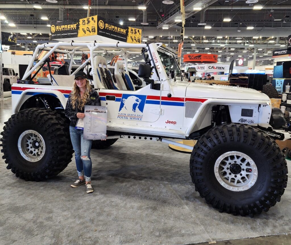 yukon influencer diana adair with jeep & award