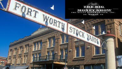 Banner at the Fort Worth Stock Yards with historic hotel, Ft. Worth, TX