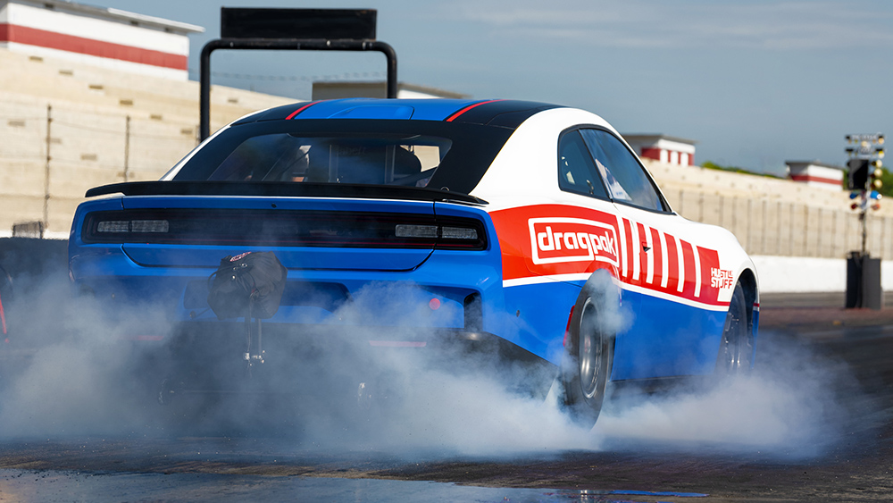 All-new 2026 Dodge Charger Hustle Stuff Drag Pak by Direct Connection from behind smoking tires