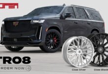 The Touren TR08 wheels in front of an SUV