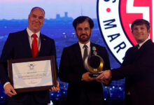 SEMA accepting FIA Award