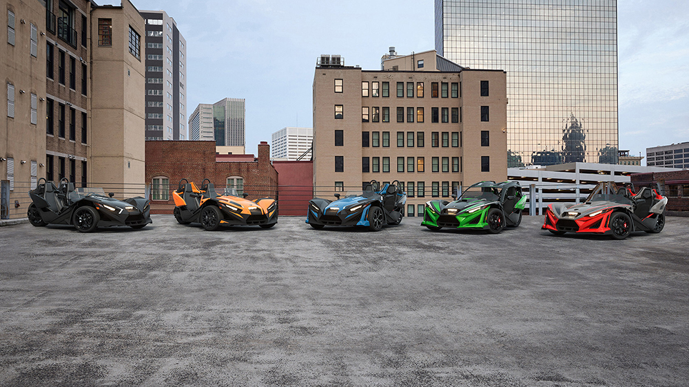 Polaris Slingshot 2026 models on top level of parking garage