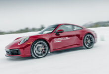 Red Porsche driving in Porsche Ice Experience