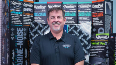 Thad Smith in front of Dynamat promotional signage