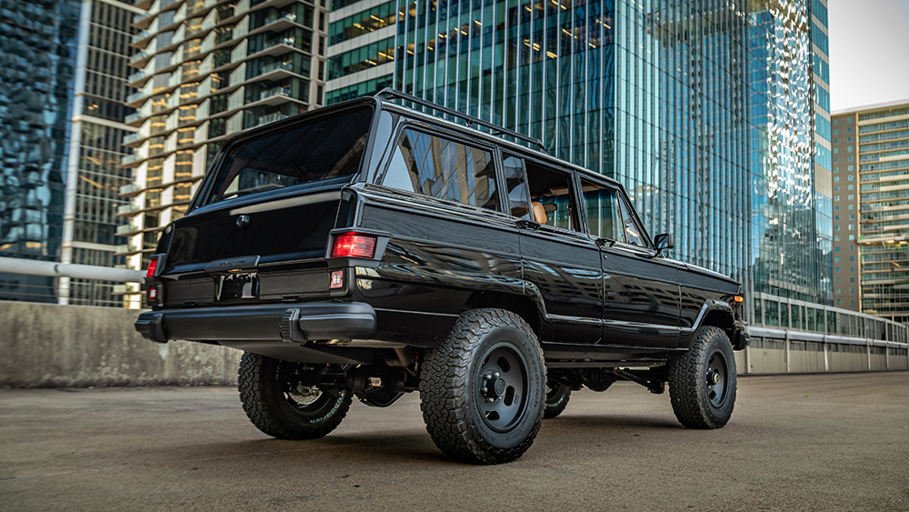 Vigilante Transforms 1979 Jeep Wagoneer restomod from rear on top of parking garage