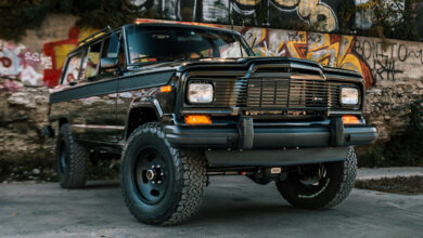 Vigilante 1979 Jeep Wagoneer restomod in front of graffiti wall