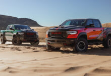 2027 Ram 1500 SRT TRX and Bloodshot Night edition parked in sand dunes