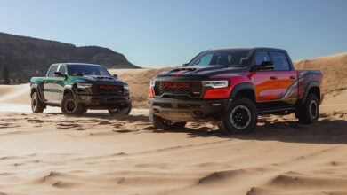 2027 Ram 1500 SRT TRX and Bloodshot Night edition parked in sand dunes