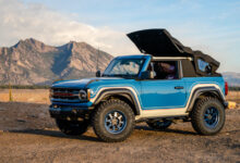 Ford Bronco with Bestop eTop parked in front of mountains