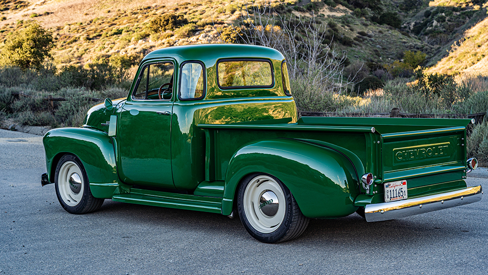 ICON Thriftmaster Old School #30 build from rear parked in gravel