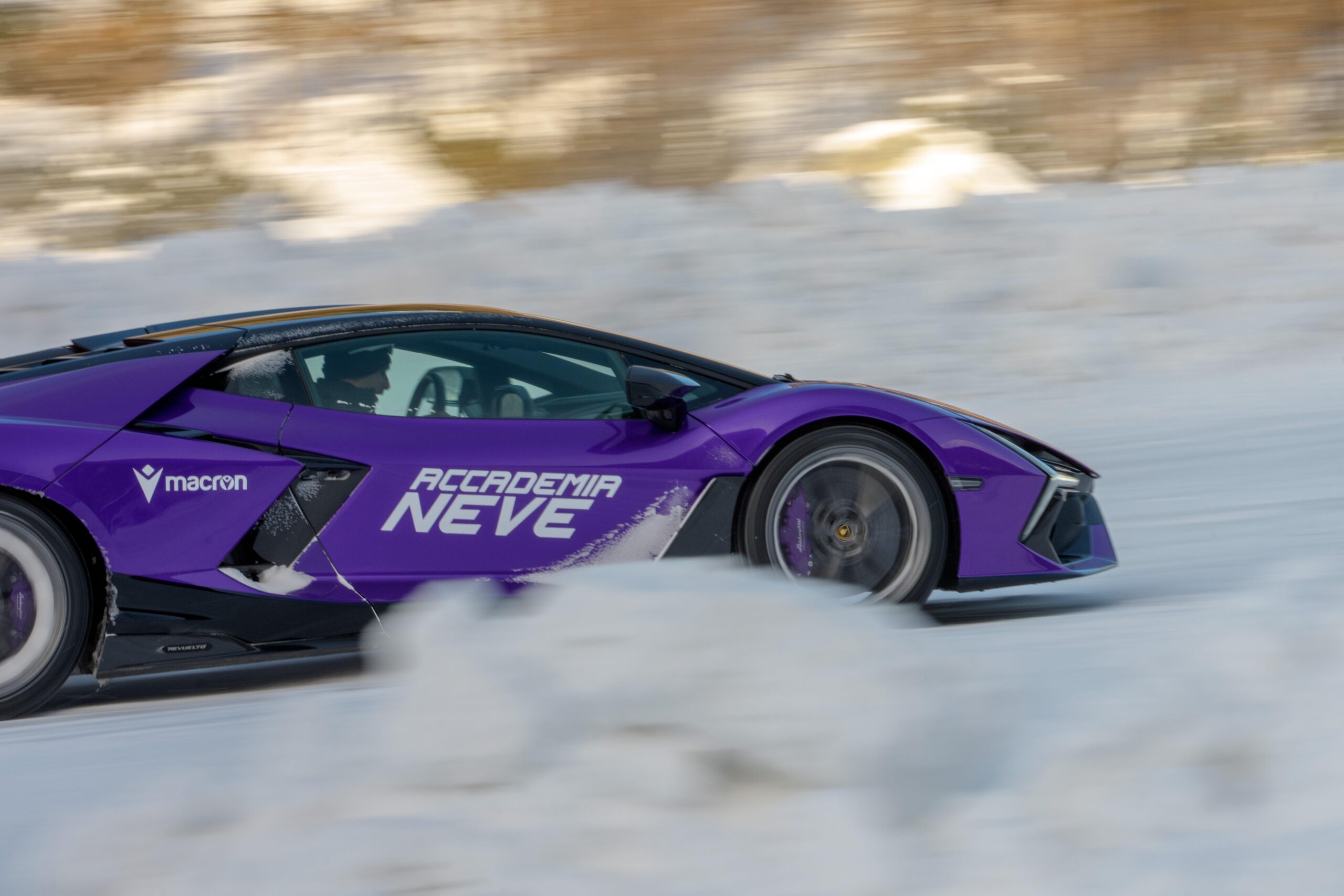 Lamborghini racing through the snow