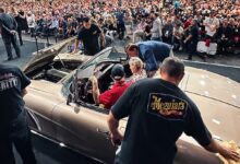 meguiars show car wipedown on stage at auction