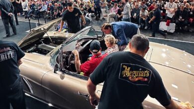 meguiars show car wipedown on stage at auction
