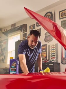 oils royal purple user under hood of red car