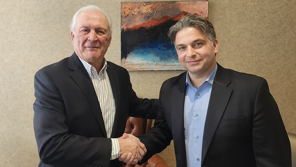 Ray Proulx and Shaun Kelso shake hands at KYB