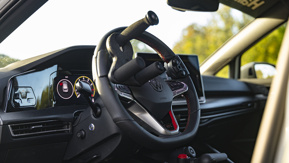 Adapted steering wheel of 2025 VW Golf GTI - © Sam Dobbins 2025