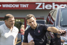 Ziebart rep talking to customer